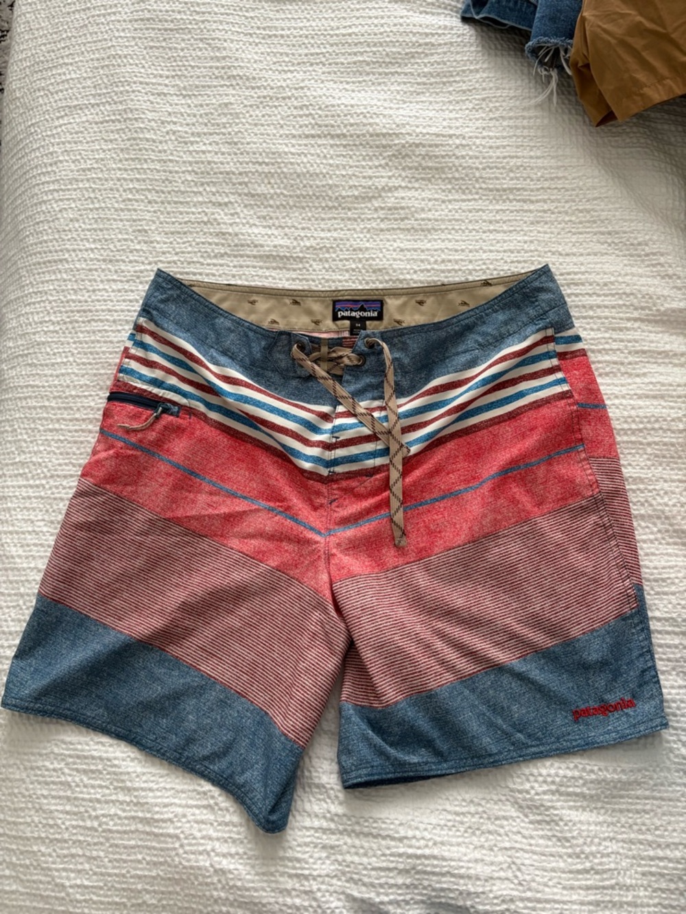 Patagonia Men’s Blue and Red Stripe Swim Trunks